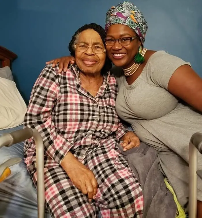 Regina Foster with her grandmother, whom her family cared for while she lived with dementia