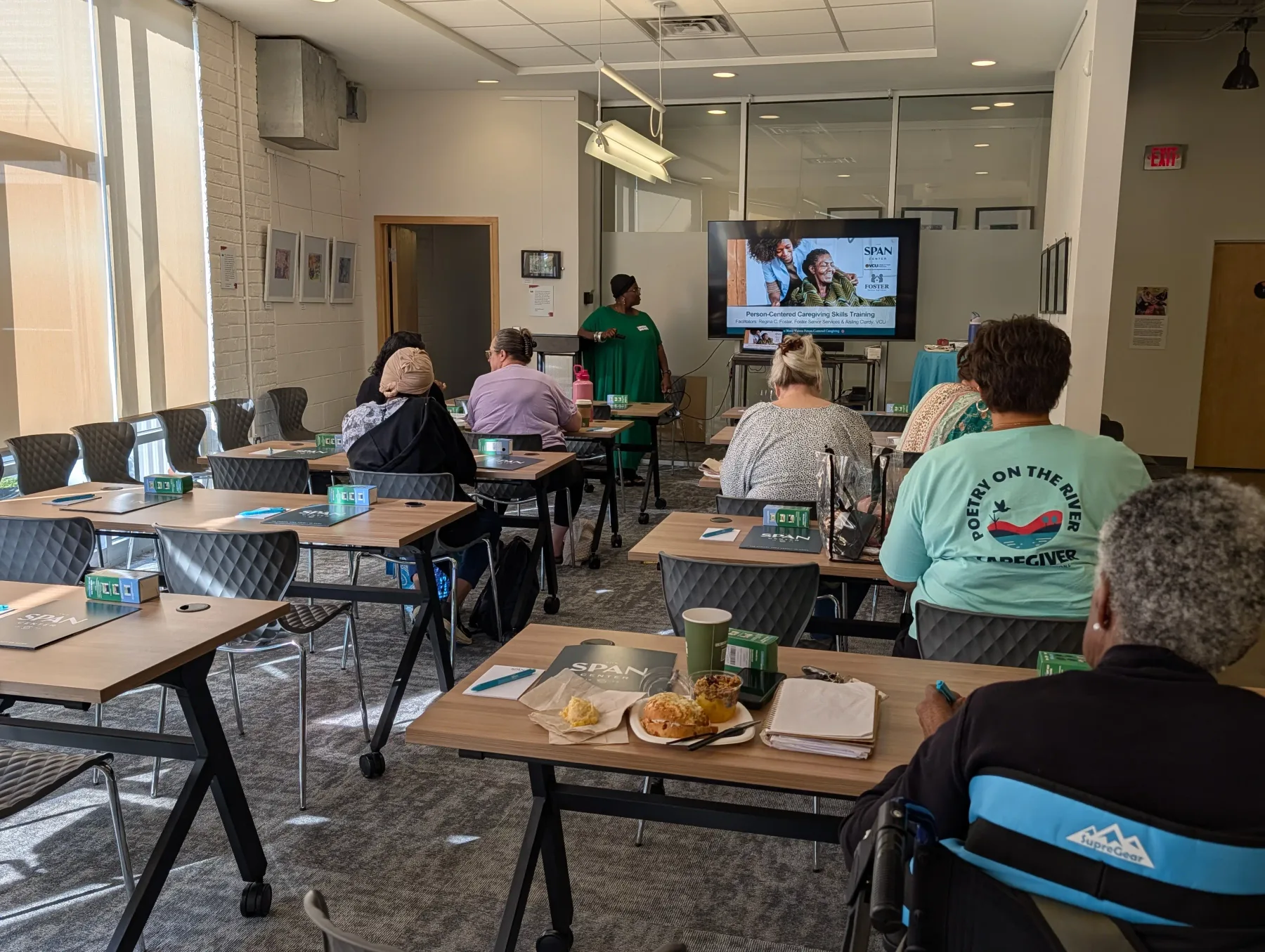 Care partners gathered for a person-centered caregiving skills training session